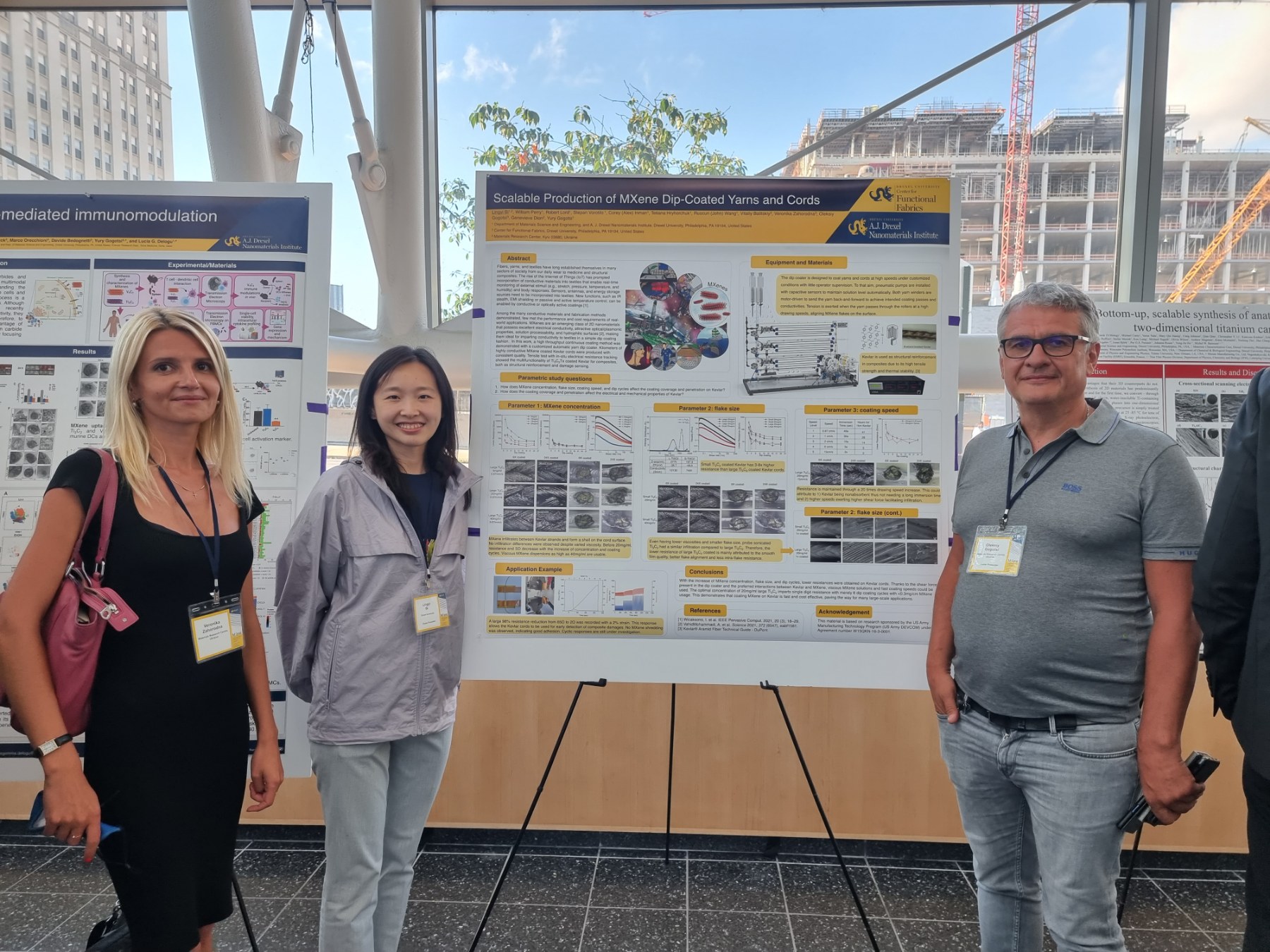Veronika Zahorodna, Lingyi Bi and Oleksiy Gogotsi at the MXene Conference, Poster session, Day 1 Scalable Production of MXene Dip-Coated Yarns and Cord