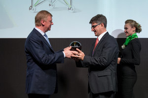 Chairman of the Executive Board of RUSNANO Anatoly Chubais handed prof. Yury Gogotsi with RUSNANOPRIZE 2015 Award