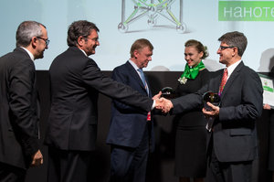 Rusnanoprize 2015 Award ceremony. From left to right - prof. Patrice Simon, Paul Sabatier University (Toulouse, France), prof. Dieter Bimberg,Executive director of the Center of Nanophotonics at Institute of Solid State Physics, Technical University of Berlin, Chairman of the Executive Board of RUSNANO Anatoly Chubais and prof. Yury Gogotsi, Drexel University (USA)