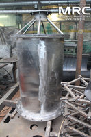 Сборка корпуса фильтра с помощью специально изготовленного устройства для сборки на стапеле