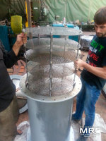 Установка тарельчатой этажерки, на ярусы которой укладываются кольца Рашига