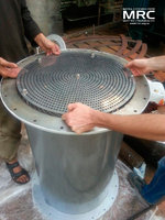 Установка тарельчатой этажерки, на ярусы которой укладываются кольца Рашига